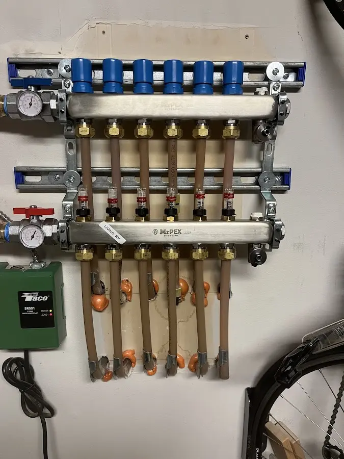 Plumber performing Water Heater Repair at a residential property in Snyderville